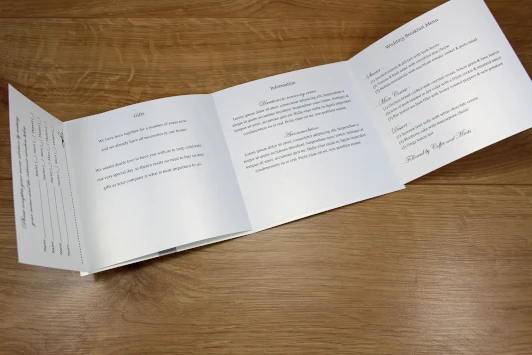Fold-out wedding invitation paper insert example