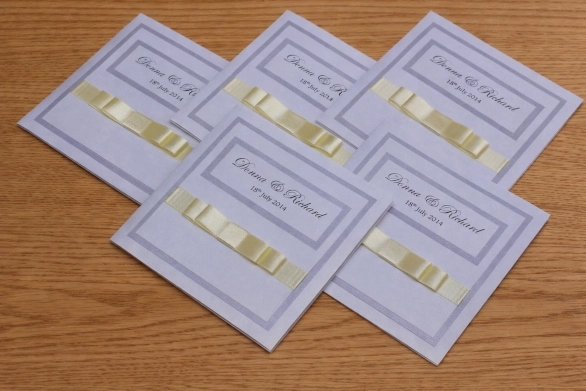 Donna & Richard from Chelmsford white and yellow wedding invitaions